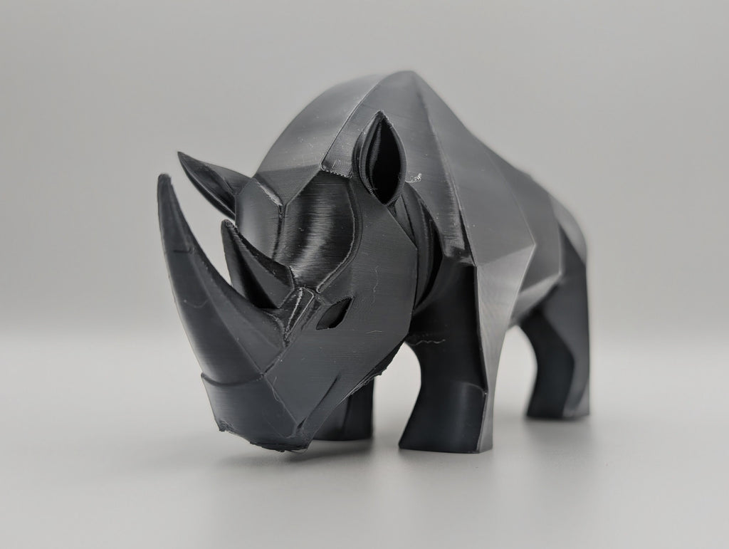Geo Rhino Sculpture sedd från sidan — Skulptur designad av Skenloft